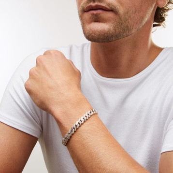 Close up view of man wearing Gold Pave Diamond Cuban Link Bracelet