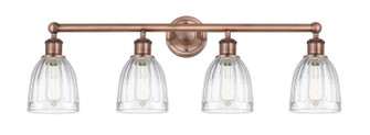 Edison Four Light Bath Vanity in Antique Copper (405|6164WACG442) Edison Four Light Bath Vanity in Antique Copper (405|6164WACG442)
