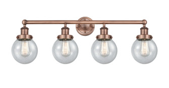 Edison Four Light Bath Vanity in Antique Copper (405|6164WACG2046) Edison Four Light Bath Vanity in Antique Copper (405|6164WACG2046)