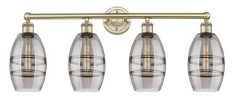 Edison Four Light Bath Vanity in Antique Brass (405|6164WABG5576SM)