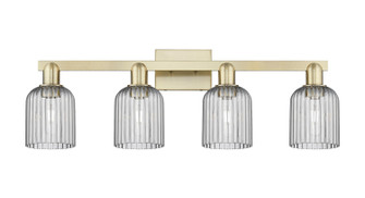 Arcadia Four Light Bath Vanity in Antique Brass (405|7164WABG5595SM)