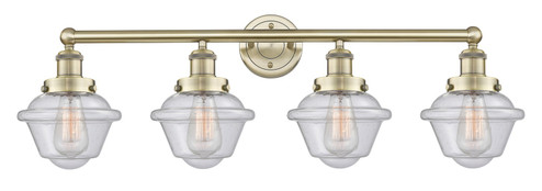 Edison Four Light Bath Vanity in Antique Brass (405|6164WABG534)