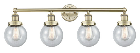 Edison Four Light Bath Vanity in Antique Brass (405|6164WABG2046)