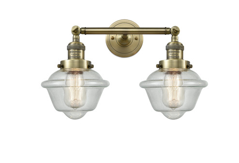 Franklin Restoration Two Light Bath Vanity in Antique Brass (405|208ABG534)
