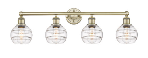 Edison Four Light Bath Vanity in Antique Brass (405|6164WABG5566CL)