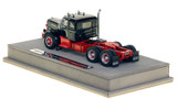 1:50 scale model of a 1954 Autocar DC-100T Tandem Axle Integral Sleeper - Black over Red