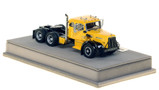 1:50 scale model of a 1954 Autocar DC-100T Tandem Axle Integral Sleeper - Yellow over Black
