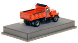 1:50 scale model of Mack® R Single Axle Dump Truck - Orange over Black
