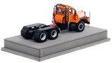 1:50 scale model of Mack DM 800 Tandem Axle Tractor - Orange over Black