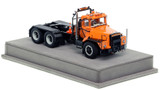 1:50 scale model of Mack DM 800 Tandem Axle Tractor - Orange over Black