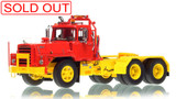 1:50 scale model of Mack DM 800 Tandem Axle Tractor - Red over Yellow