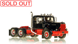 1:50 scale model of a 1954 Autocar DC-100T Tandem Axle Integral Sleeper - Black over Red