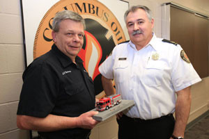 Columbus Sutphen Scale Model Presented to Columbus Assistant Fire Chief