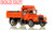 1:50 scale model of Mack® R Single Axle Dump Truck - Orange over Black