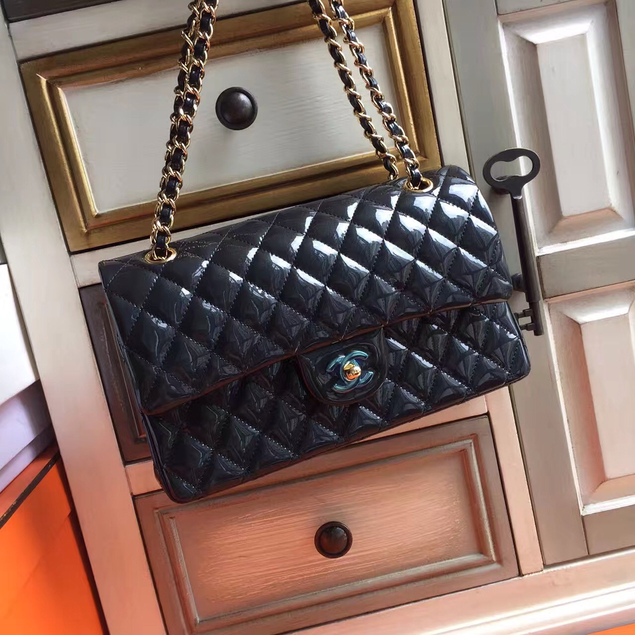 CHANEL Black Quilted Patent Leather Gold Hardware Flap Bag - Bella Vita Moda