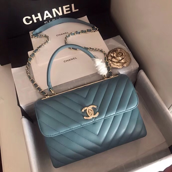 small flap bag with top handle