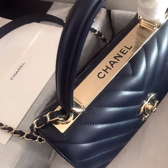 small flap bag with top handle chanel