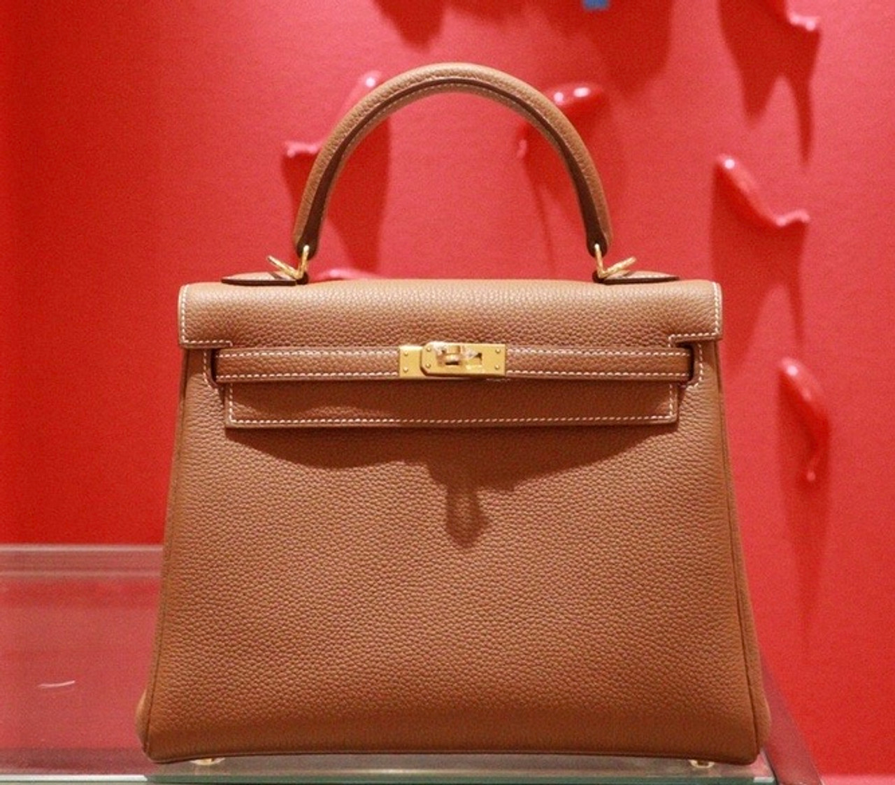 gold kelly bag