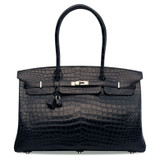 Why stylish men are now turning to handbags 