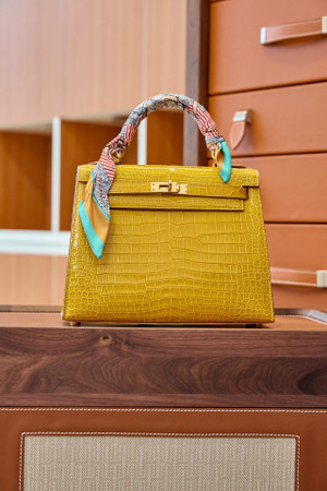 Hermes SHINY JAUNE AMBER NILOTICUS CROCODILE KELLY 25 WITH GOLD HARDWARE