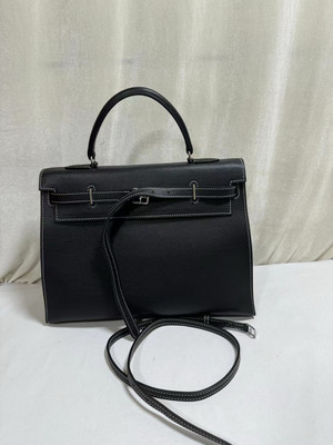 Hermes  A PARCHEMIN SWIFT LEATHER  BLACK KELLY FLAT 35 BAG