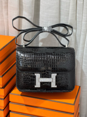 HERMES SHINY BLACK POROSUS CROCODILE MINI CONSTANCE 18 WITH 18K WHITE GOLD & DIAMOND HARDWARE