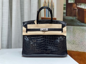 HERMES SHINY BLACK POROSUS CROCODILE DIAMOND BIRKIN 25 WITH 18K WHITE DIAMOND HARDWARE
