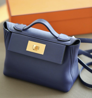 Hermès Mini 24/24 – 21 Bag M3 Blue Encre Evercolor/Swift leather  Hermès Mini 24/24 – 21 Bag M3 Blue Encre Evercolor/Swift leather