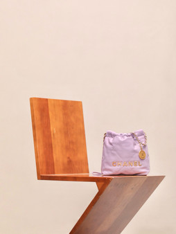 CHANEL 22 MINI HANDBAG GOLD LOGO SS2023 LILAC