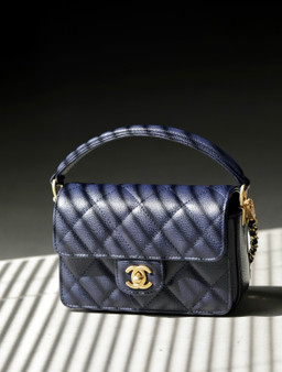 Chanel FALL-WINTER 2024/25   MINI FLAP BAG WITH TOP HANDLE BLUE