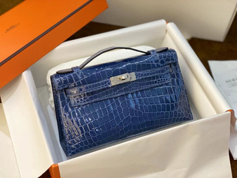 Hermès Shiny Blue Alligator Kelly Pochette Palladium Hardware Hermès Shiny Blue Alligator Kelly Pochette Palladium Hardware
