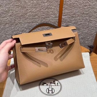 Hermès Biscuit Mini Kelly Pochette Swift leather Palladium hardware