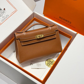 Hermès Gold Mini Kelly Pochette Swift leather Gold hardware