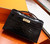  Hermes Black Mini Kelly Pochette Gator Shine with Gold Hardware
