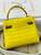 Hermes Kelly Idole (Kelly Doll) in Mimosa Yellow Aligator with Palladium hardware.