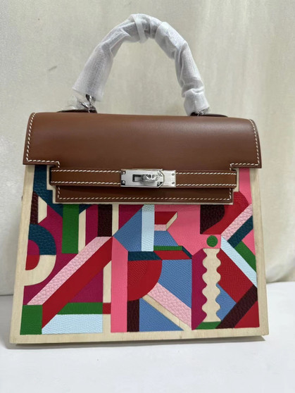 Hermès Limited Edition Fauve Barenia, Multicolor Clemence, Togo, Epsom, Madame, Tadelakt, Chèvre and Wood Kellywood Perspective Cavaliere Kelly 22 Palladium Hardware Hermès Limited Edition Fauve Barenia, Multicolor Clemence, Togo, Epsom, Madame, Tadelakt, Chèvre and Wood Kellywood Perspective Cavaliere Kelly 22 Palladium Hardware