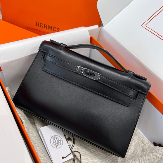 Hermès Limited Edition So-Black Mini Kelly Pochette Box Calf Leather  Hermès Limited Edition So-Black Mini Kelly Pochette Box Calf Leather