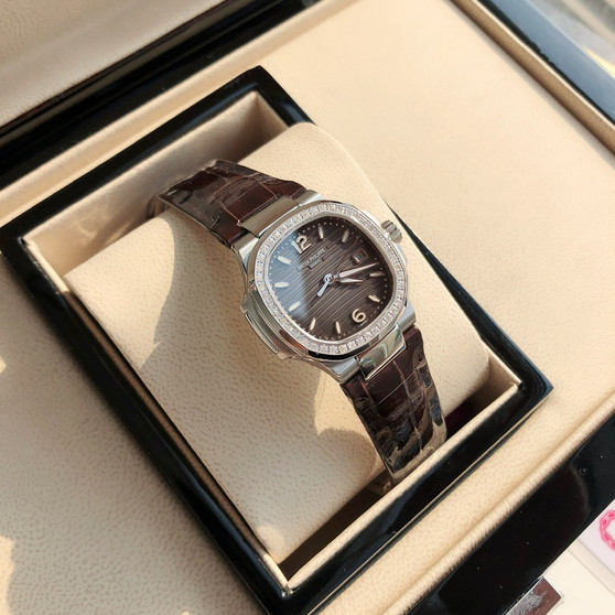 Patek Philippe Nautilus 7010R Ladies Quartz Watch Silver Grey Diamond Bezel
