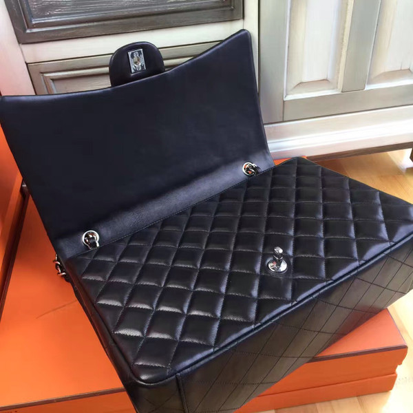 Chanel Black Quilted Lambskin Maxi Classic Double Flap Bag