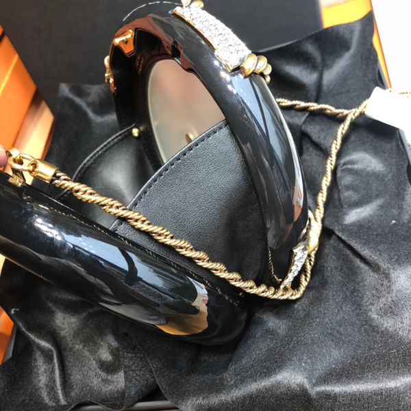 Chanel A MÉTIERS D’ART RUNWAY PARIS-HAMBURG BLACK LUCITE, STRASS & GOLD RUDDER EVENING BAG