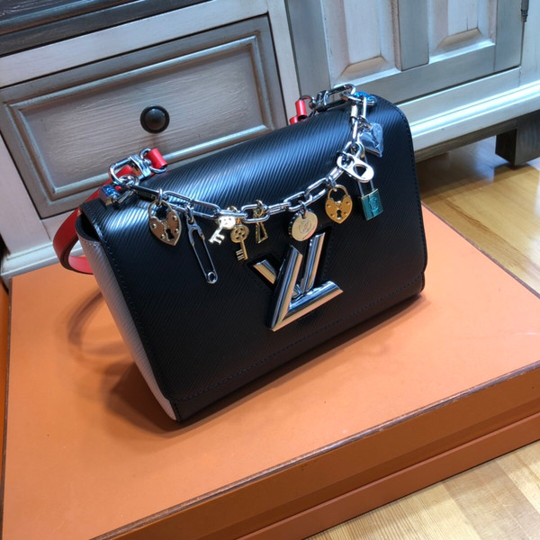 Louis Vuitto Limited Edition TWIST MM Chain Bag with Charms