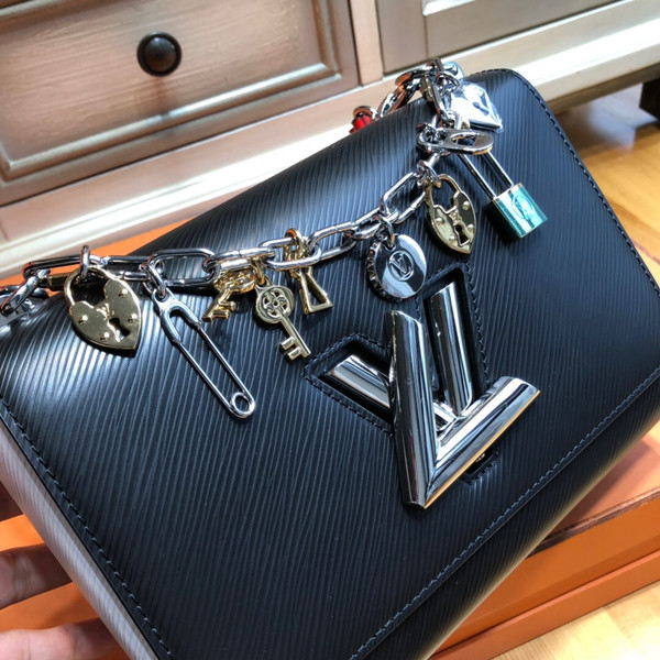 Louis Vuitto Limited Edition TWIST MM Chain Bag with Charms