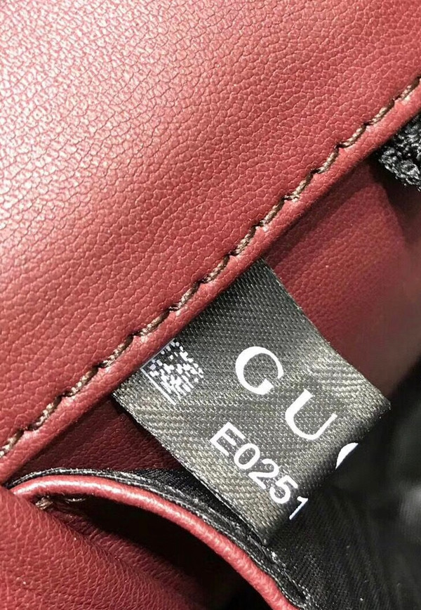 Gucci Zumi snakeskin medium top handle bag