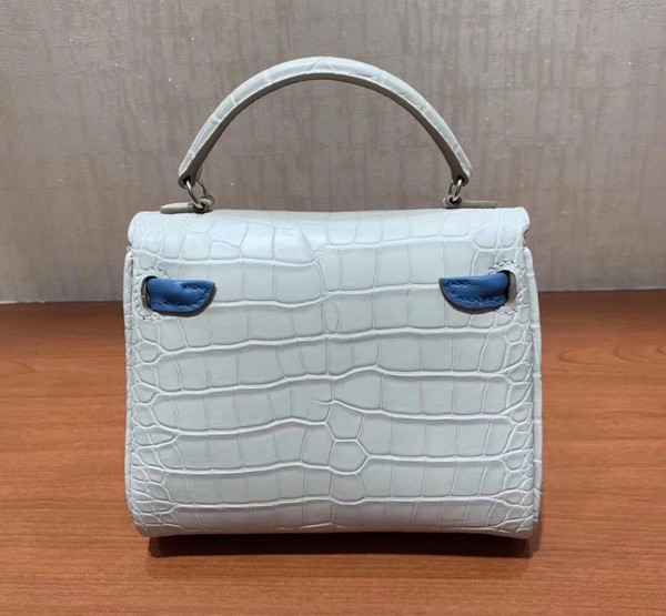 Hermes Kelly Idole (Kelly Doll) in GRIS PERLE Alligator with Palladium hardware.