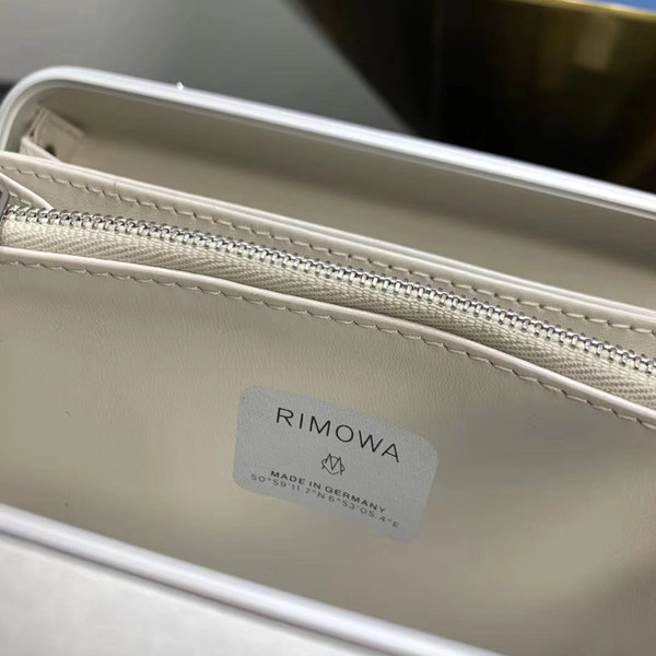Christian Dior Gray DIOR AND RIMOWA PERSONAL CLUTCH IN ALUMINUM AND GRAINED CALFSKIN