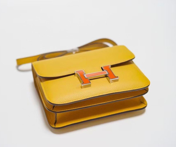 Hermes Jaune d'or Constance Epsom leather 18cm With Enamel Hardware