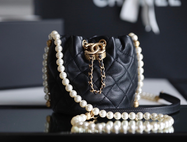 Chanel mini pearl drawstring bag