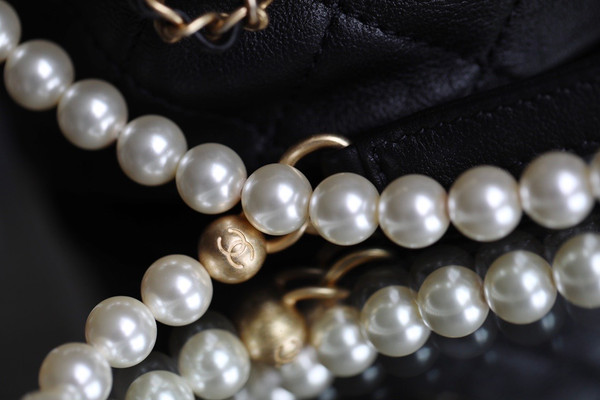 Chanel mini pearl drawstring bag