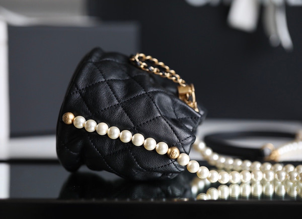 Chanel mini pearl drawstring bag