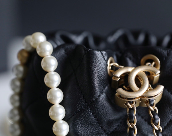 Chanel mini pearl drawstring bag